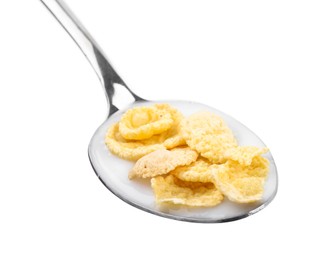 Photo of Breakfast cereal. Corn flakes and milk in spoon isolated on white