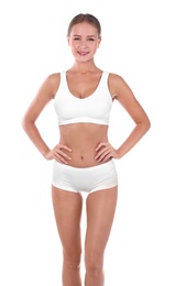 Slim woman in underwear on white background. Healthy diet
