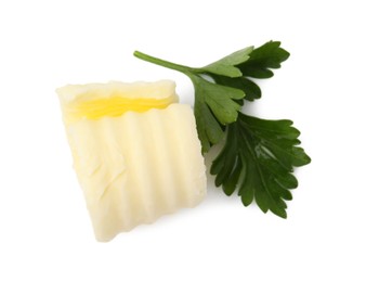 Tasty butter curl and fresh parsley isolated on white, top view