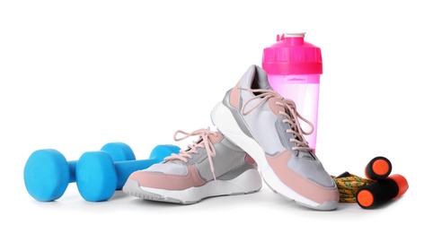 Photo of Composition with fitness gym equipment on white background