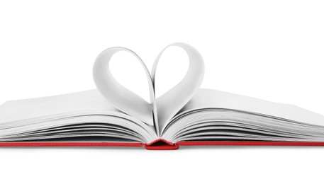 Photo of Open book with pages folded in heart on white background, closeup