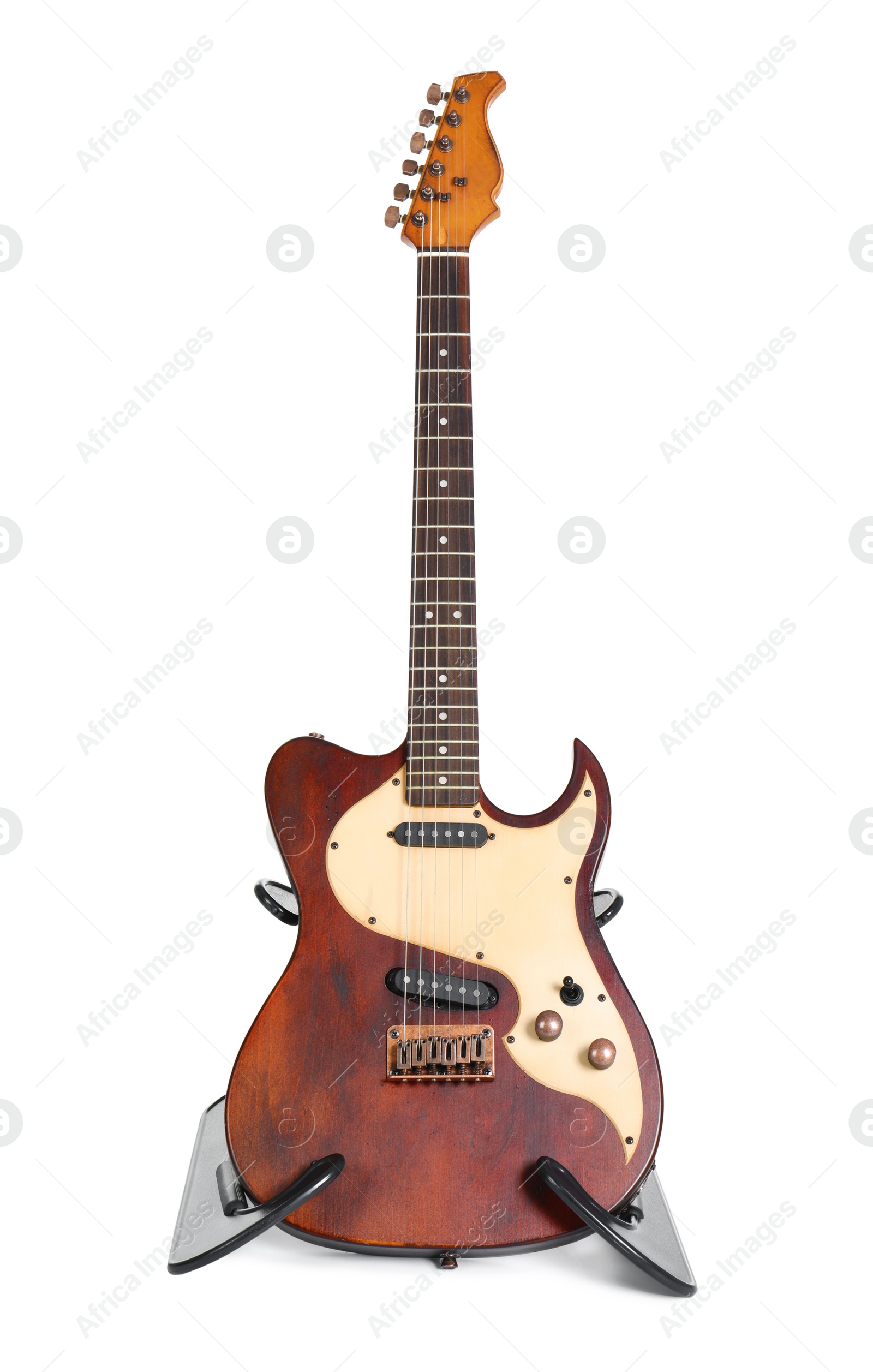 Photo of Electric guitar on stand against white background