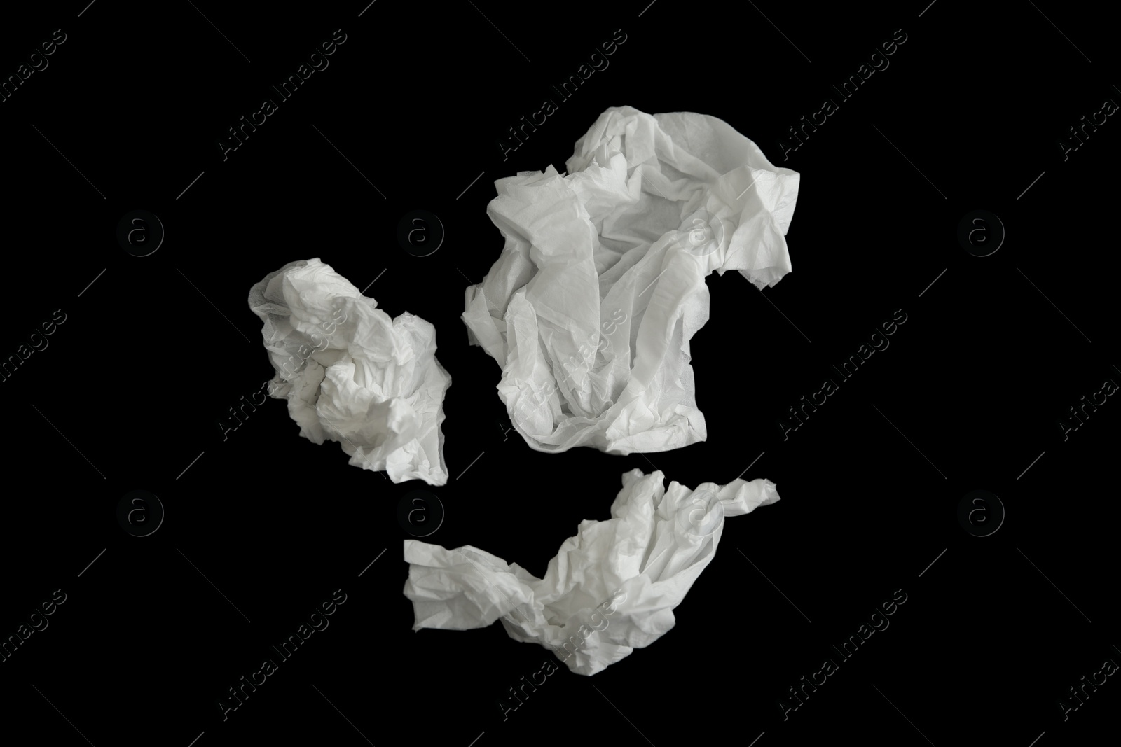 Photo of Used paper tissues on black background, flat lay