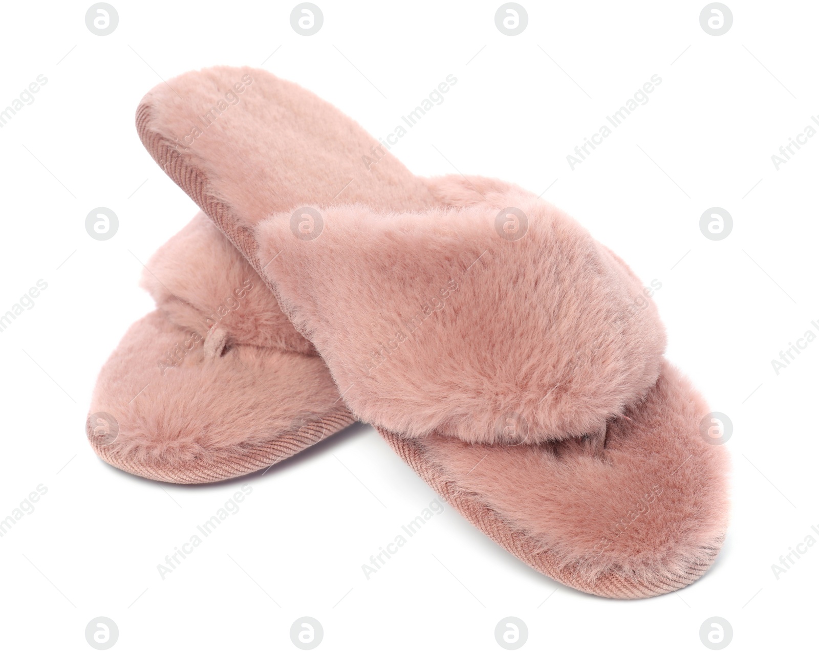 Photo of Pair of pink soft slippers isolated on white