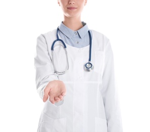 Female doctor offering helping hand on white background, closeup