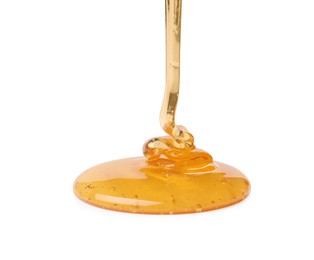 Photo of Pouring tasty natural honey isolated on white