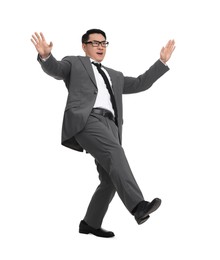 Photo of Businessman in suit posing on white background