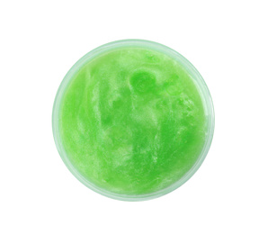 Photo of Green slime in plastic container isolated on white, top view. Antistress toy