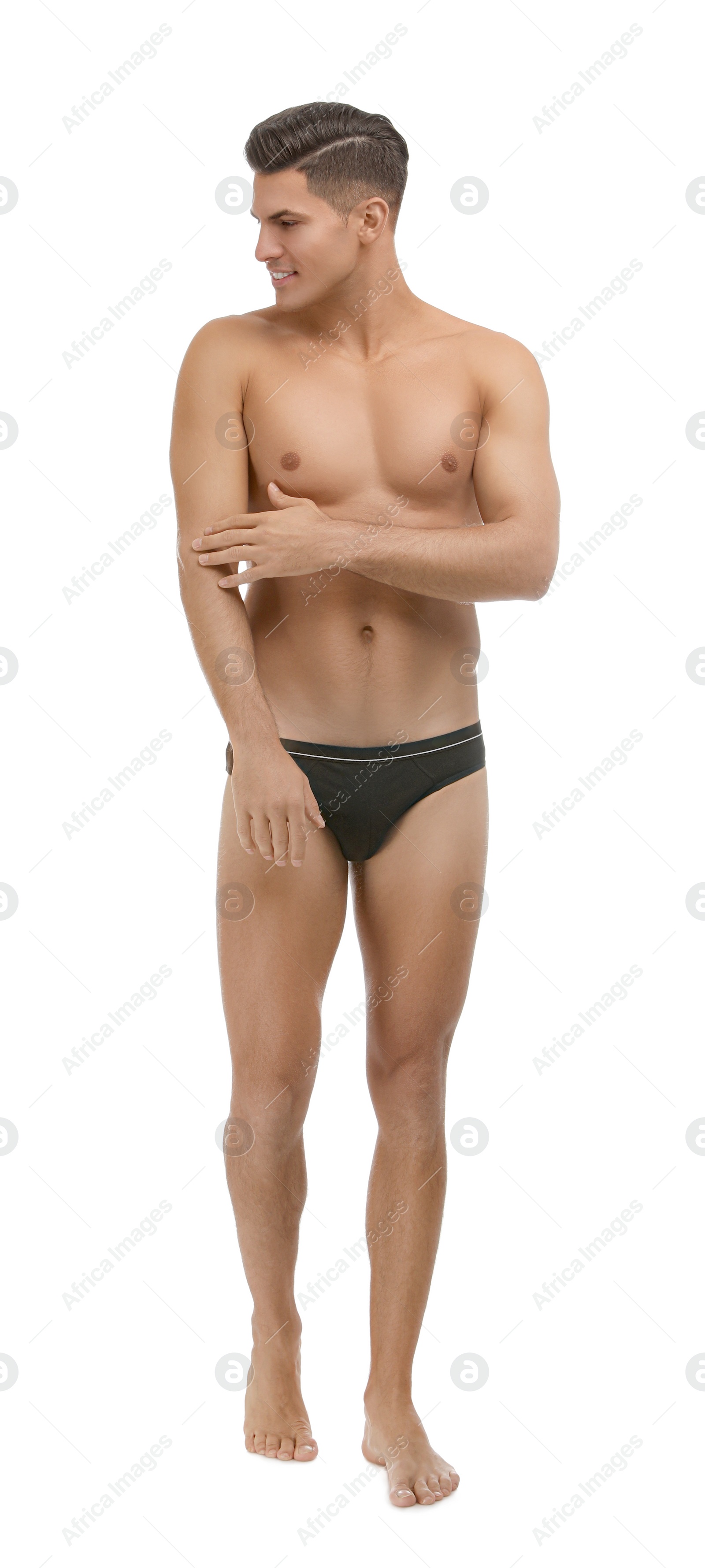 Photo of Handsome man in black underwear on white background