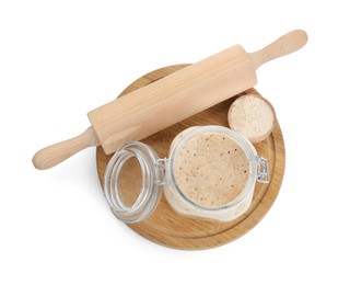 Photo of Leaven and rolling pin isolated on white, top view