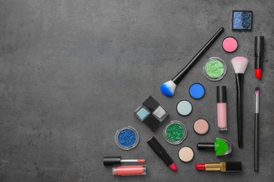 Flat lay composition with cosmetic products on grey background