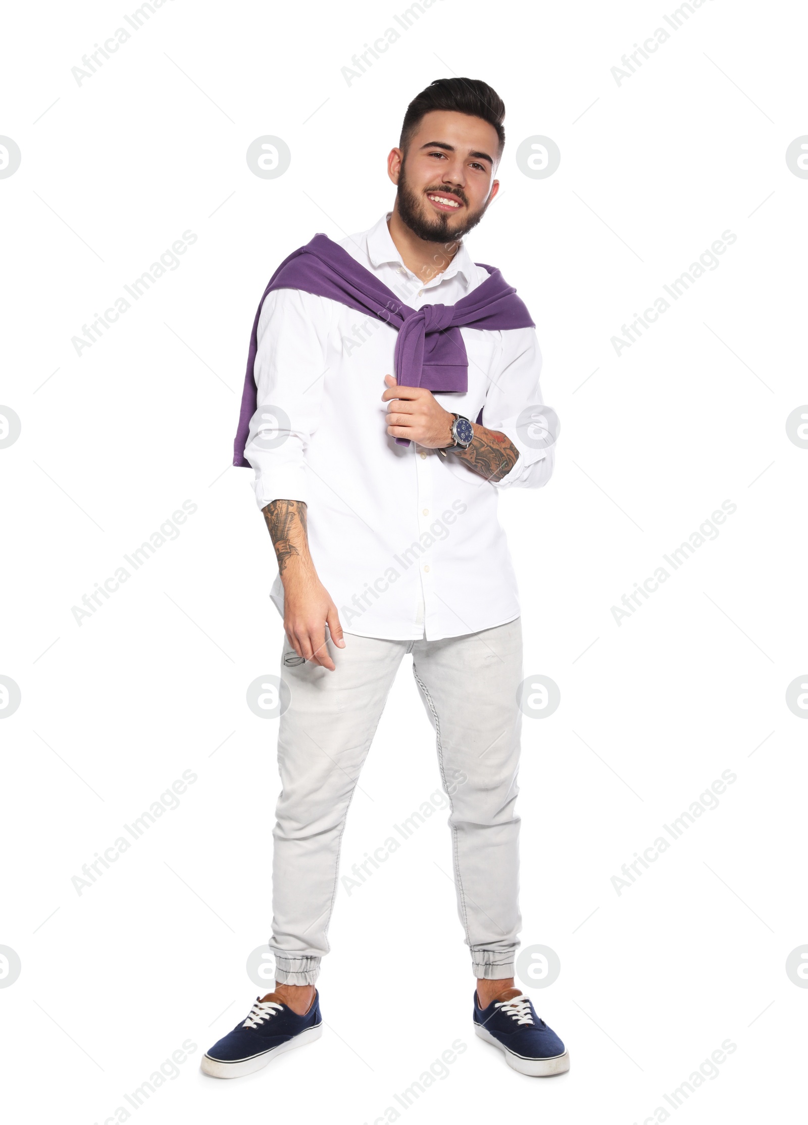 Photo of Portrait of handsome young man on white background