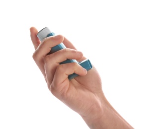 Photo of Man holding asthma inhaler on white background, closeup