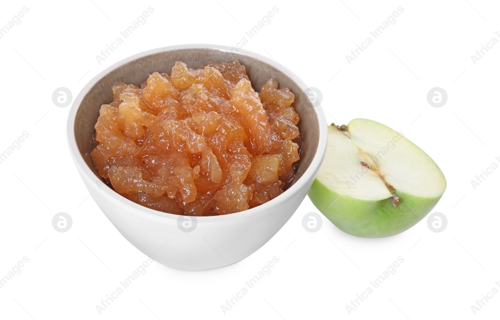 Photo of Delicious apple jam in bowl and half of fresh apple isolated on white