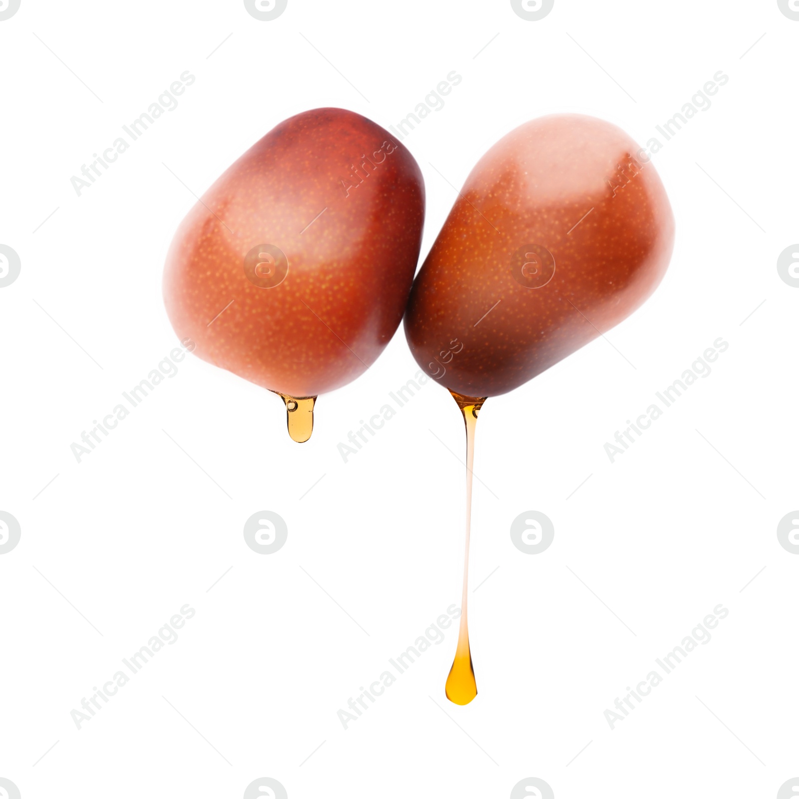 Image of Oil dripping from palm fruits on white background