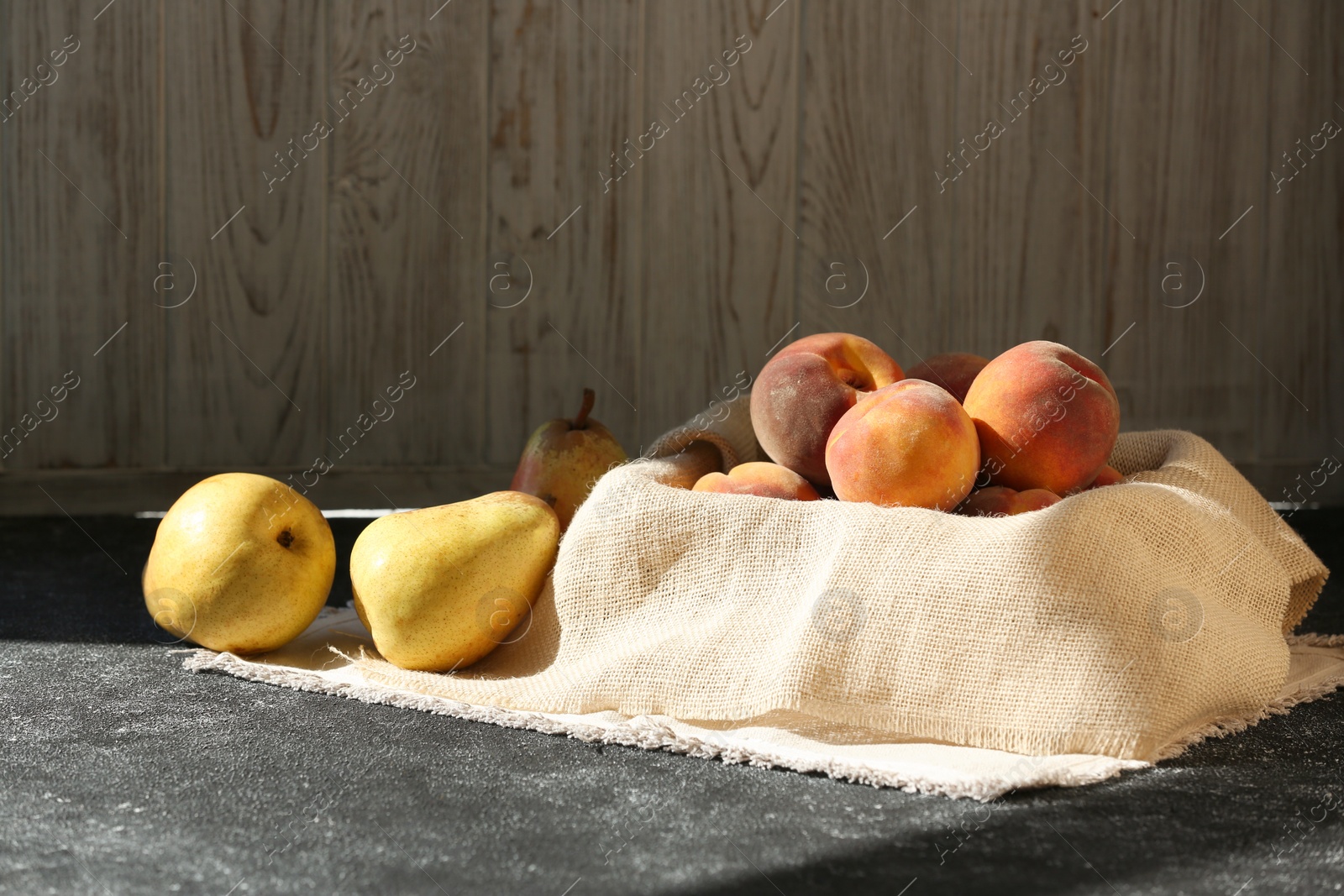 Photo of Juicy fruits and double-sided backdrops in photo studio