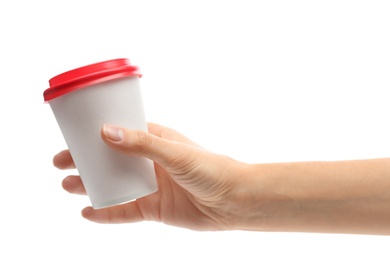 Woman holding takeaway paper coffee cup on white background