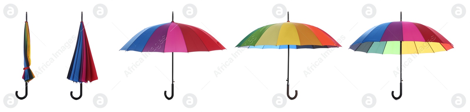 Image of Set with different colorful umbrellas on white background. Banner design