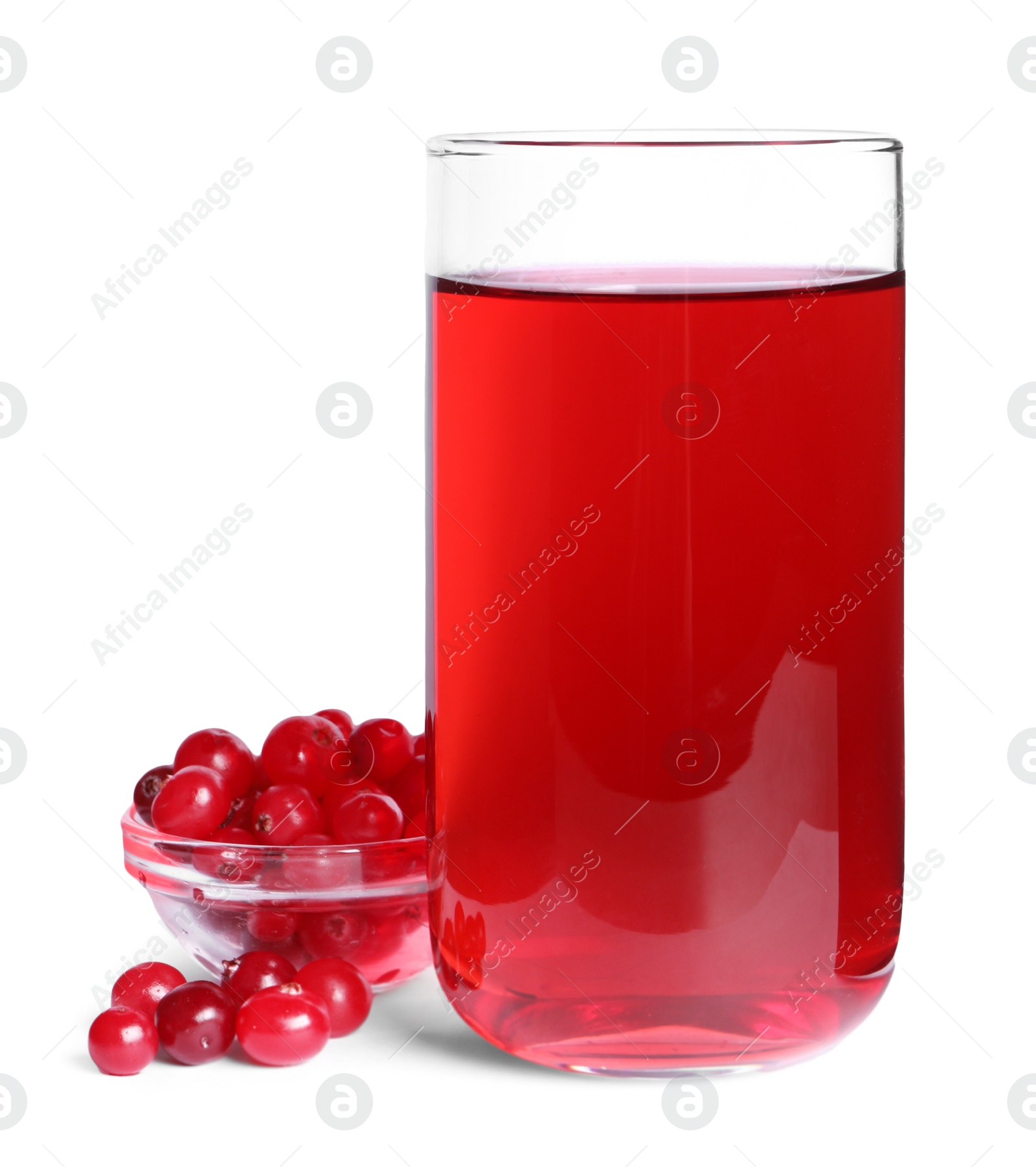 Photo of Tasty cranberry juice in glass and fresh berries isolated on white