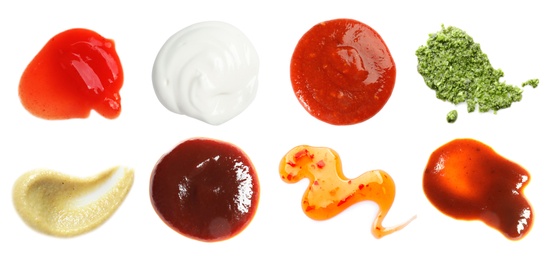 Image of Set with samples of different sauces on white background