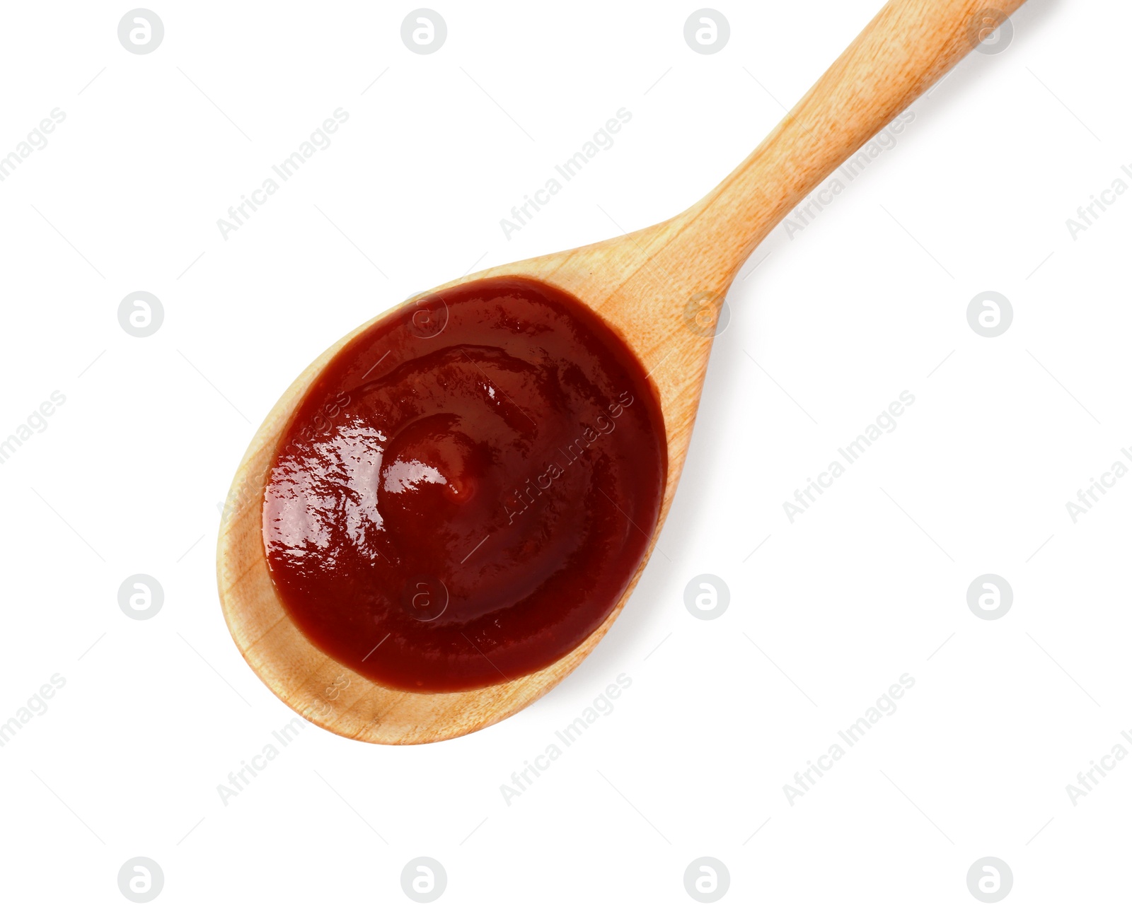 Photo of Tasty barbecue sauce and spoon isolated on white, top view