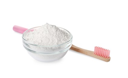 Photo of Glass bowl of tooth powder and brush on white background