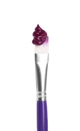 Photo of Brush with purple paint isolated on white