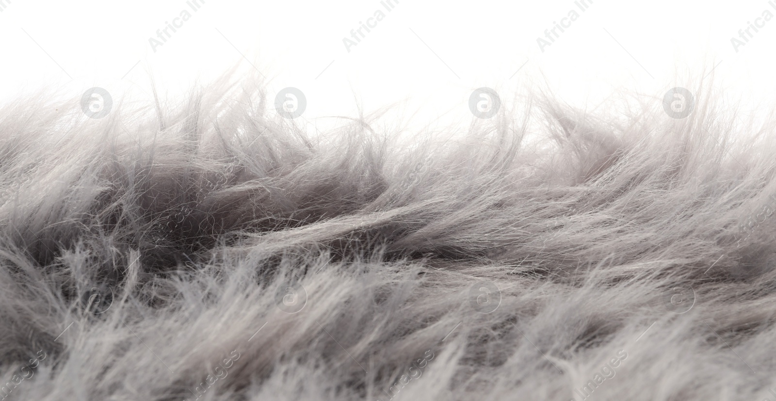 Photo of Soft grey faux fur isolated on white