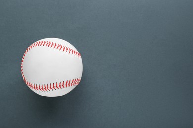 Photo of Baseball ball on dark background, top view with space for text. Sports game