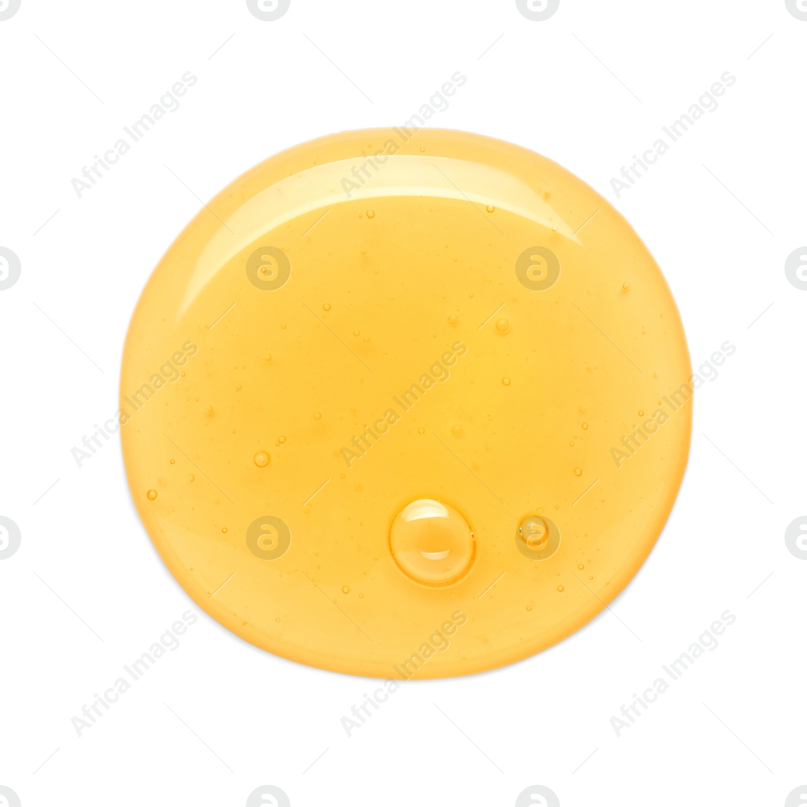 Photo of Drop of tasty natural honey isolated on white, top view