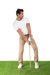 Young man playing golf on white background