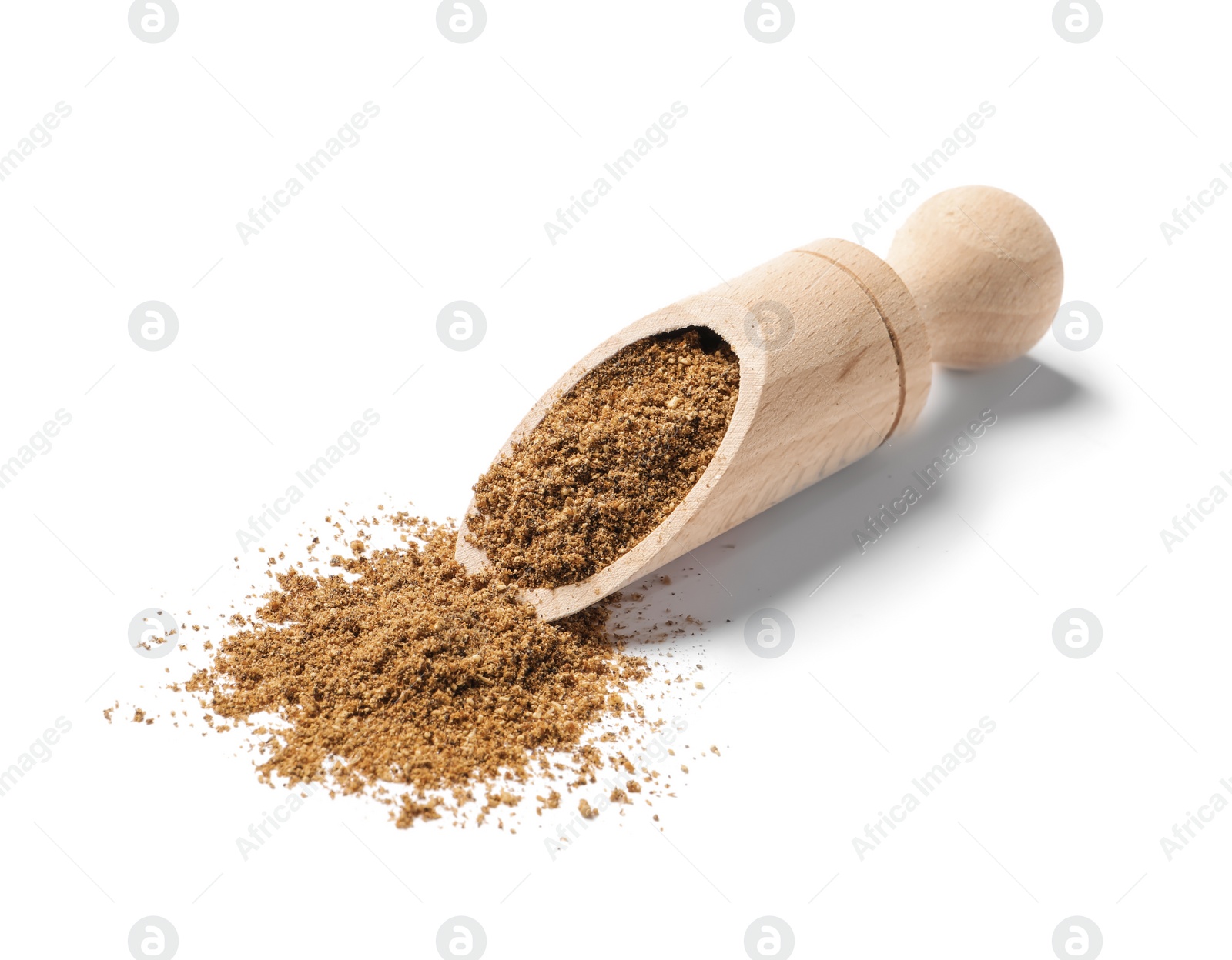 Photo of Scoop and aromatic caraway (Persian cumin) powder isolated on white