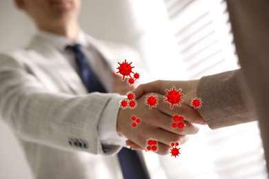 Avoid physical contact during coronavirus outbreak. People shaking hands, closeup