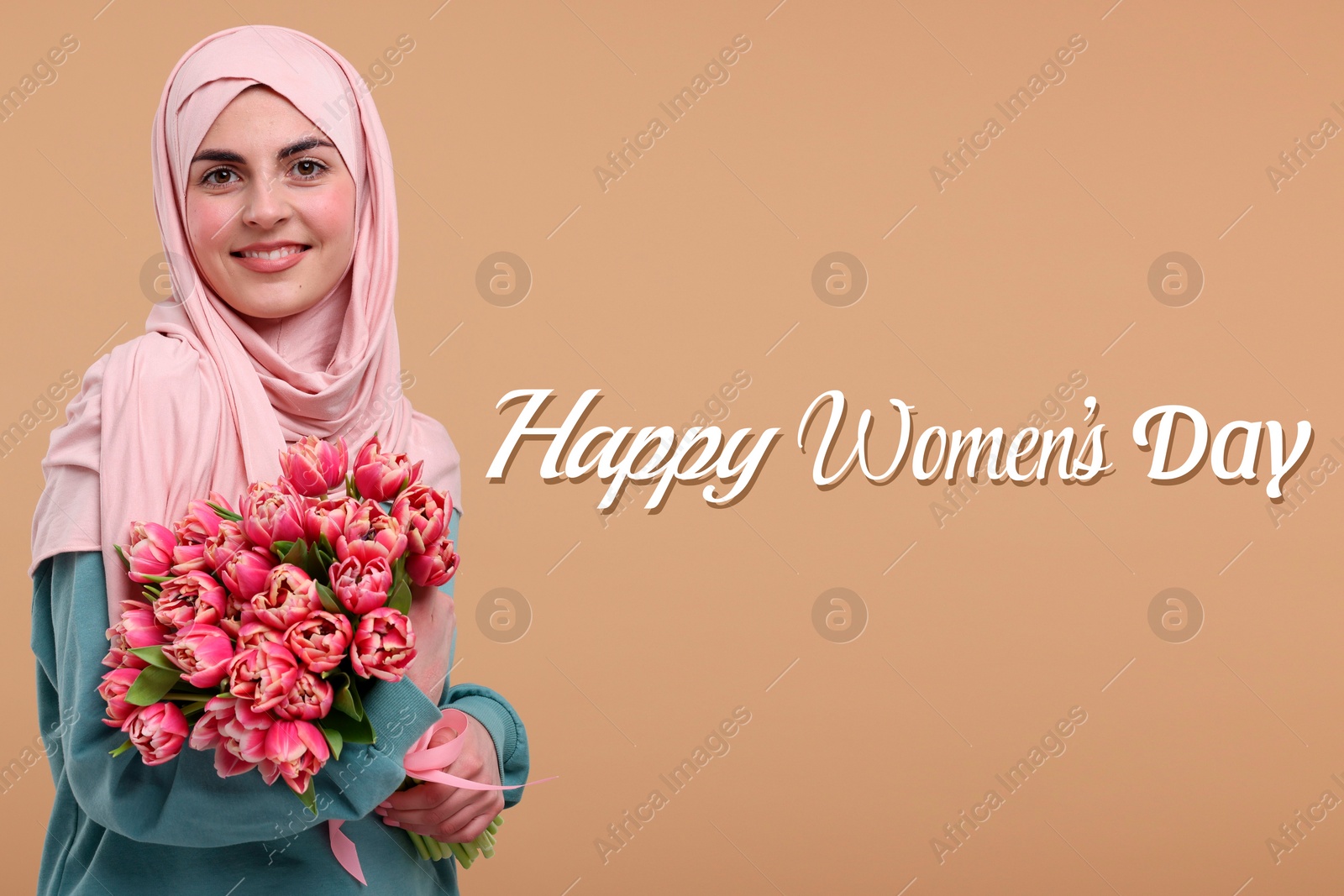 Image of Happy Women's Day - March 8. Attractive lady in hijab with bouquet of tulips on dark beige background