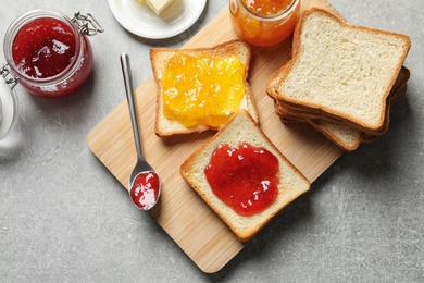 Photo of Toast bread with jams on table, top view