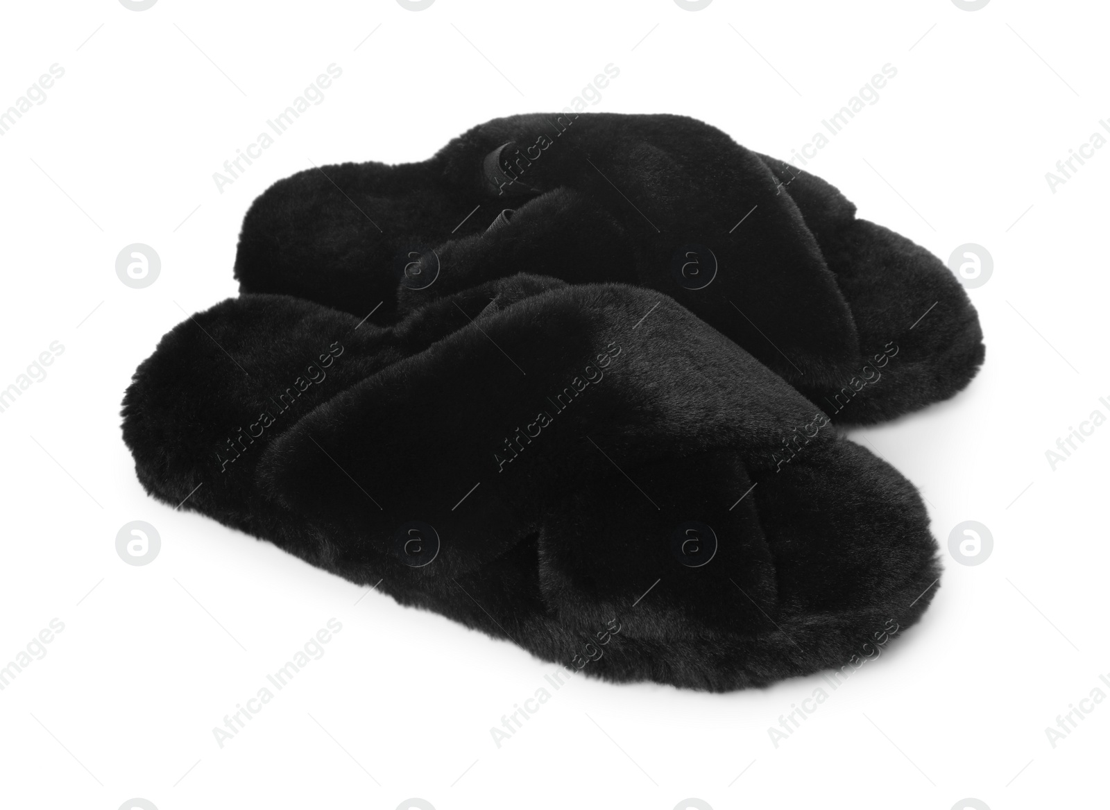 Photo of Pair of black fluffy slippers isolated on white