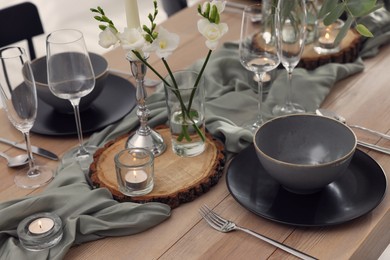 Photo of Festive table setting with beautiful tableware and decor
