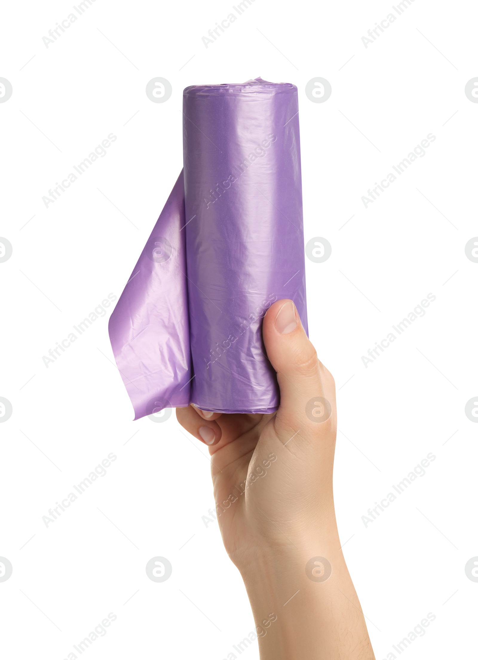 Photo of Woman holding roll of violet garbage bags on white background, closeup. Cleaning supplies