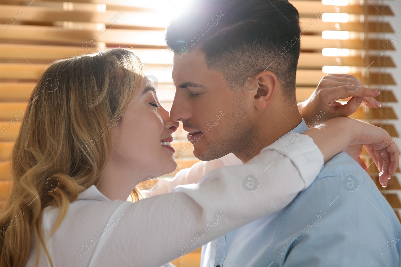 Photo of Lovely couple enjoying time together at home