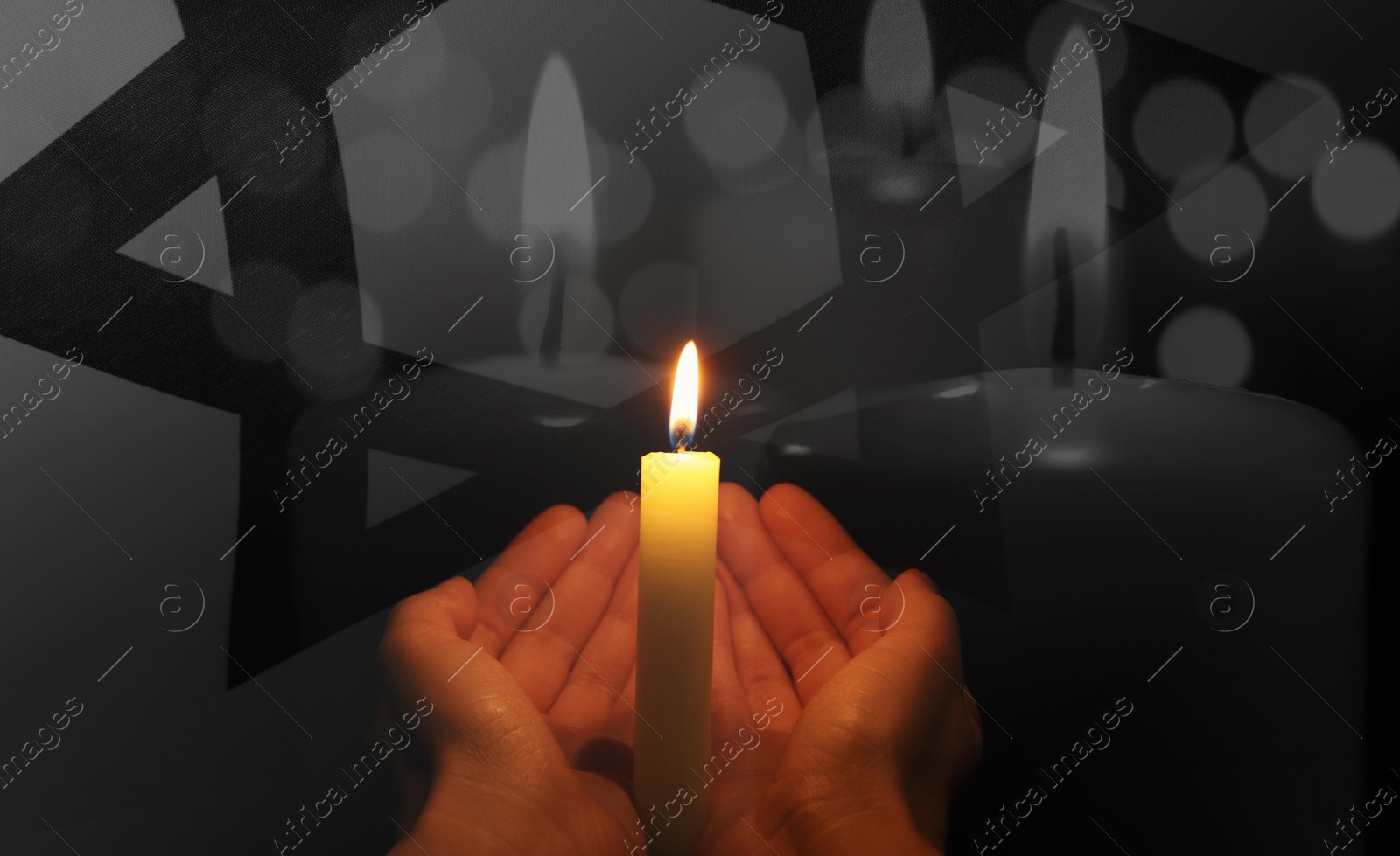 Image of Holocaust memory day, banner design. Woman with burning candle and flag of Israel, double exposure