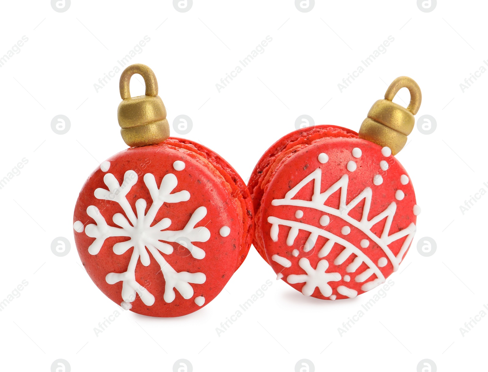 Photo of Beautifully decorated Christmas macarons on white background