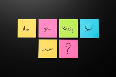 Photo of Black chalkboard with phrase Are You Ready For Exams made of stickers as background