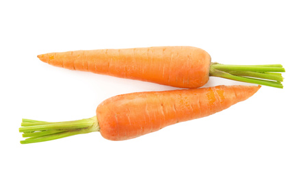 Photo of Fresh ripe juicy carrots isolated on white, top view