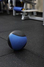 Photo of Blue medicine ball on floor in gym