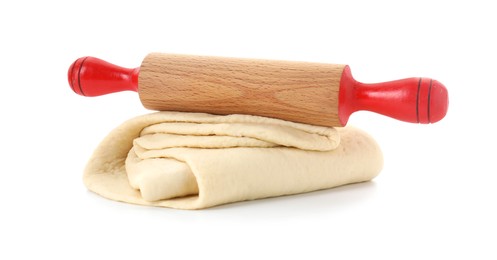 Photo of Raw dough and rolling pin isolated on white