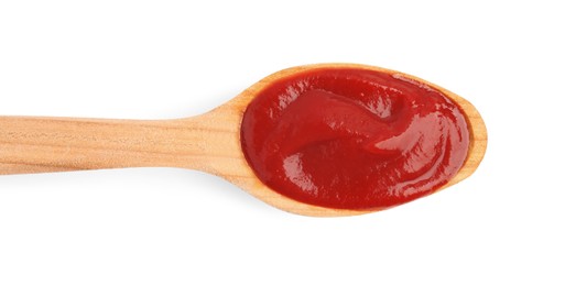 Photo of Wooden spoon with tasty ketchup isolated on white, top view