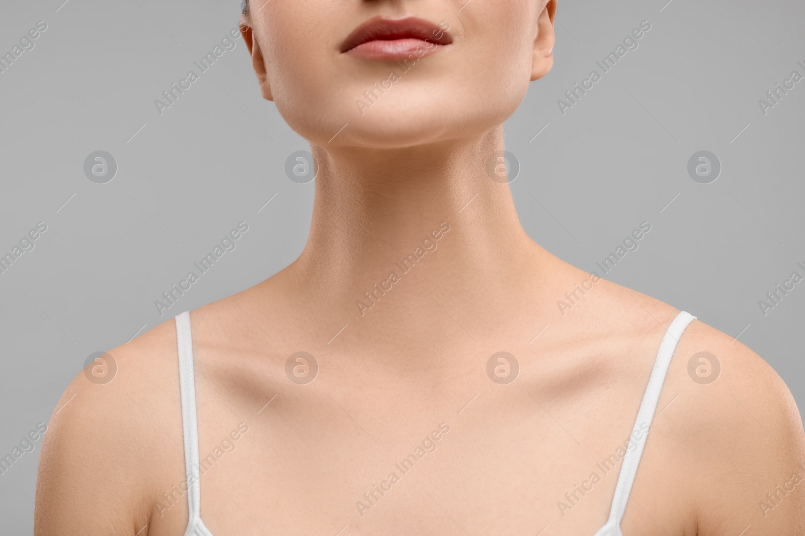 Photo of Beauty concept. Woman on grey background, closeup