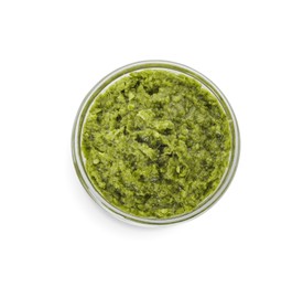 Delicious pesto sauce in bowl isolated on white, top view