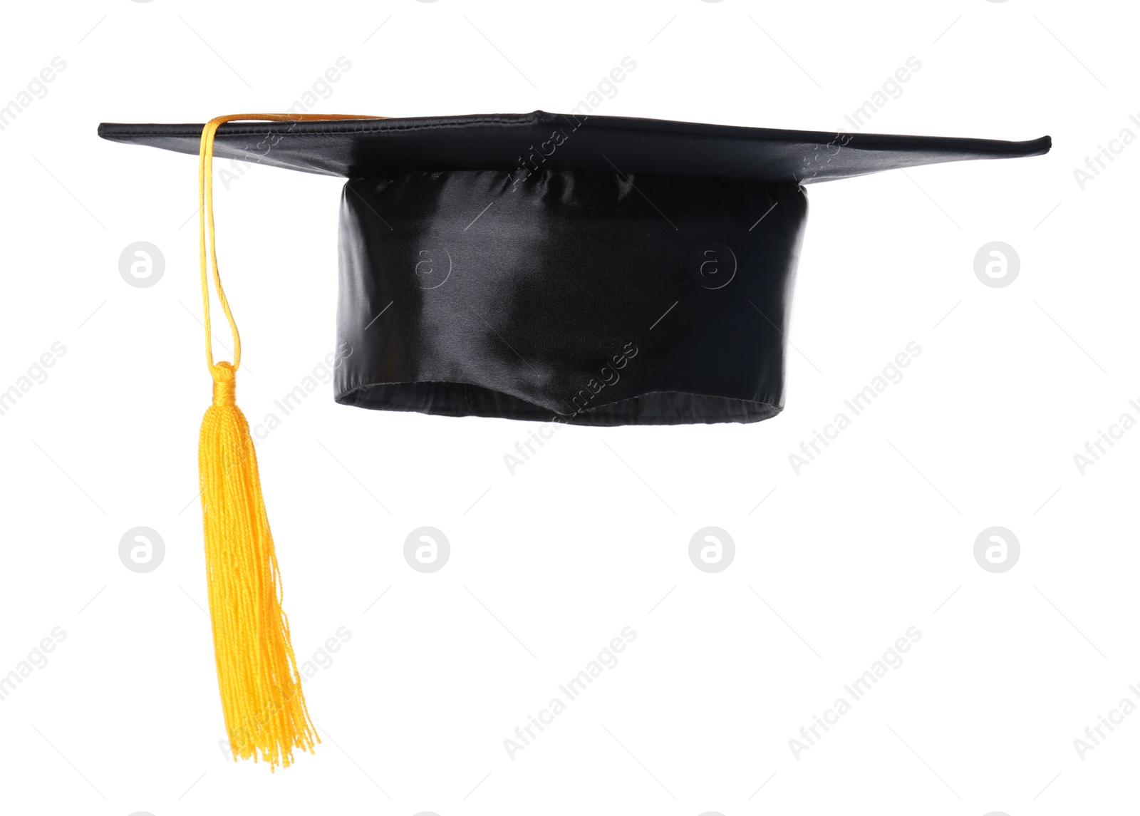 Photo of Graduation hat with gold tassel isolated on white