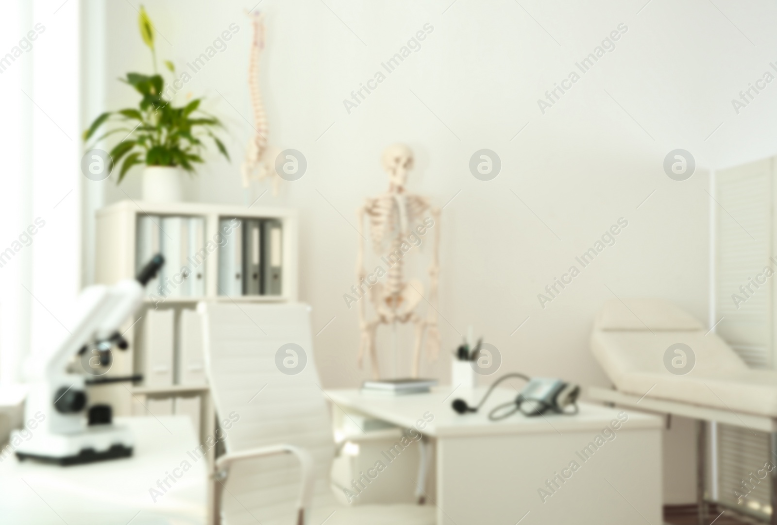 Photo of Interior of modern medical office. Doctor's workplace